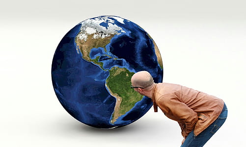 person looking at planet earth thumbnail