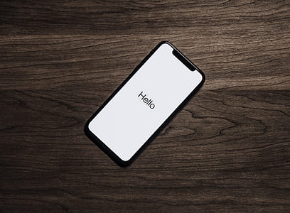 Black Iphone 7 on Brown Table thumbnail