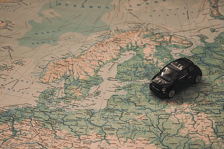 photo of black hatchback die-cast model on map thumbnail