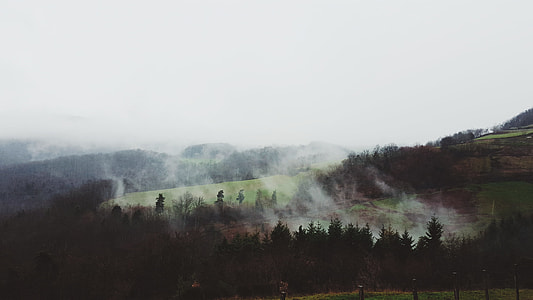 smokey mountain under white clouds thumbnail