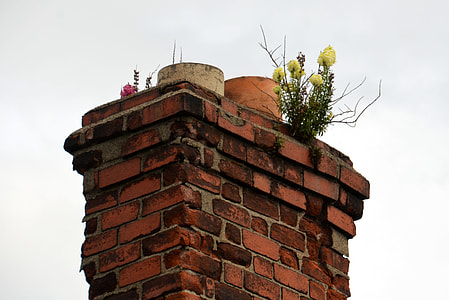 close-up photography of orange brick chimney thumbnail
