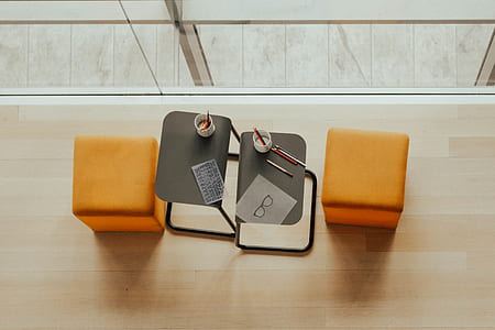 two white ceramic mug on gray coffee tables thumbnail