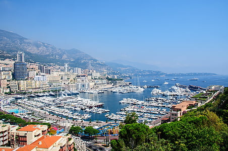 boats docked near city thumbnail
