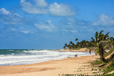 Couple on the Beach in Brazil under blue sky thumbnail