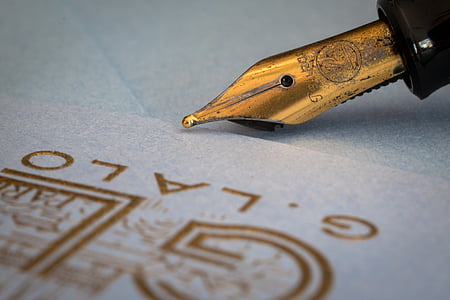 black and brown fountain pen in closeup photo thumbnail
