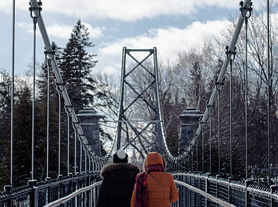two people crossing bridge thumbnail