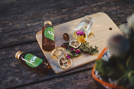 three glass bottles on chopping board thumbnail