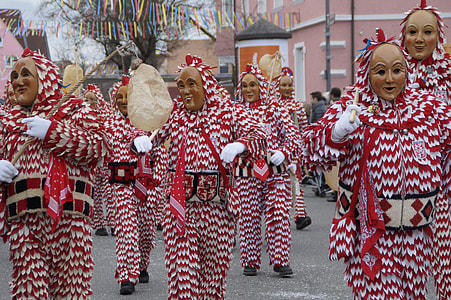 group of people wearing mask and doing parade at daytime thumbnail