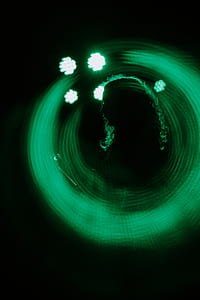 silhouette of woman with green lights thumbnail