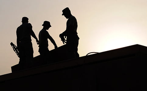silhouette photo of three men thumbnail