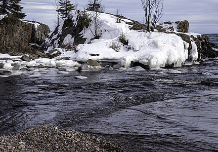 Rock Covered in snow at Temperance River State Park, Minnesota thumbnail