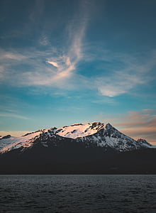 mountain under blue sky thumbnail