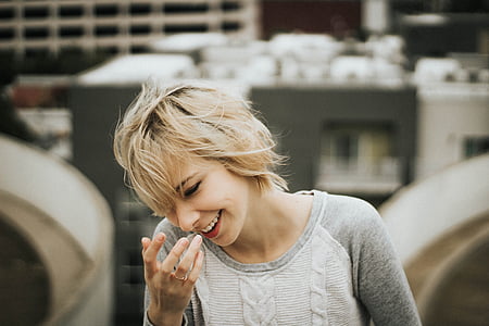 woman smiling outdoors thumbnail