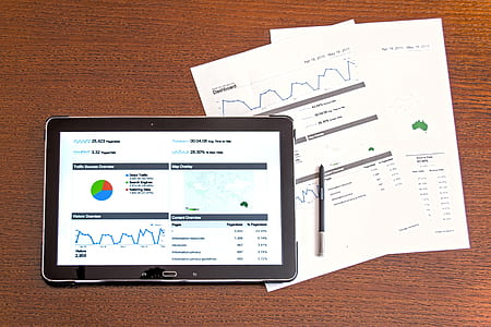black tablet computer beside stylus pen thumbnail
