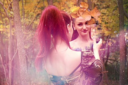 portrait photography of woman looking at the mirror thumbnail