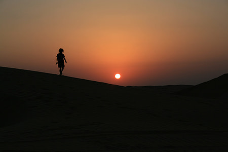 silhouette of person during sunset thumbnail