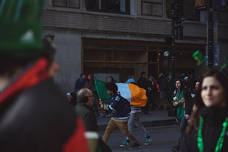 group of people walking on gray road thumbnail