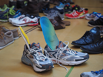 assorted-color shoes on floor thumbnail