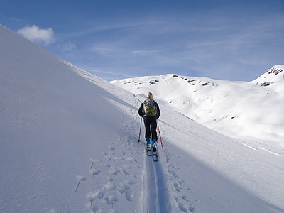 person skiing on snow covered mountain thumbnail