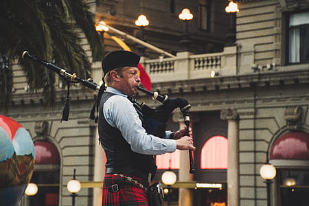 Man Playing Wind Instrument thumbnail
