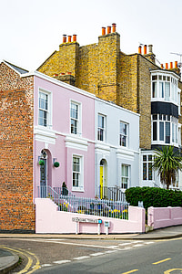 pink and white painted 2-storey house thumbnail