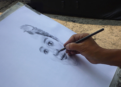 person doing portrait sketch thumbnail