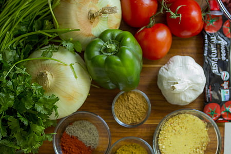 assorted vegetables beside powder-filled glass bowls thumbnail