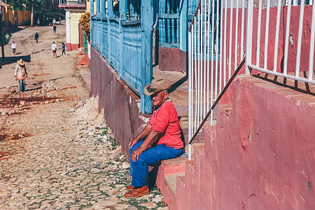 man sitting on stair thumbnail
