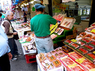man holding frozen goods thumbnail