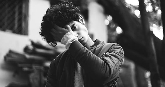 man wiping up his hair thumbnail
