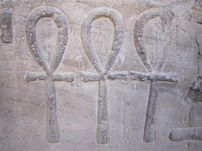 three life symbol embossed on concrete surface thumbnail