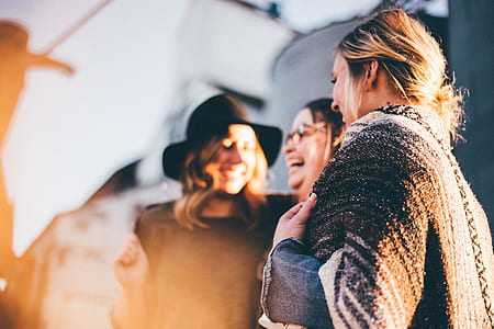 three women standing thumbnail