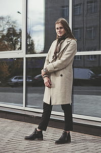 Woman Standing Near Glass Building thumbnail