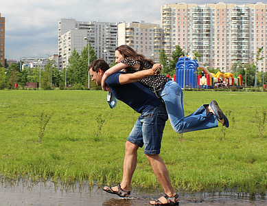 man carrying woman in his back while walking on water thumbnail