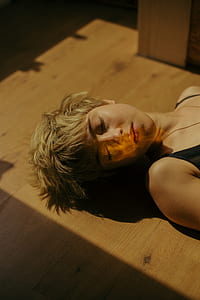 woman lying on floor thumbnail