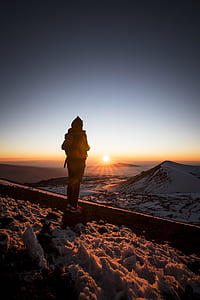 person standing on top of mountain thumbnail