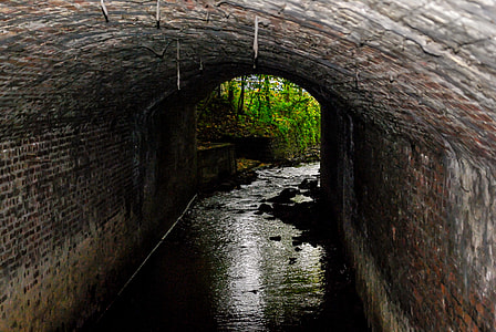 brown concrete tunnel canal at daytime thumbnail