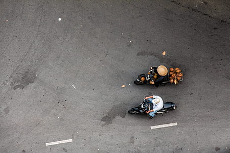 aerial photo of two person riding on motorcycles thumbnail