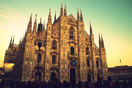 brown concrete cathedral during daytime thumbnail