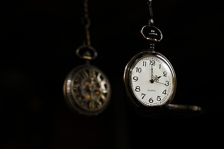 two gold-colored pocketwatch closeup photo thumbnail