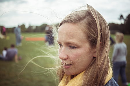 selective focus photography of woman with yellow scarf thumbnail