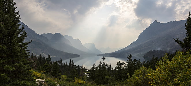 gray mountain beside body ofwater thumbnail