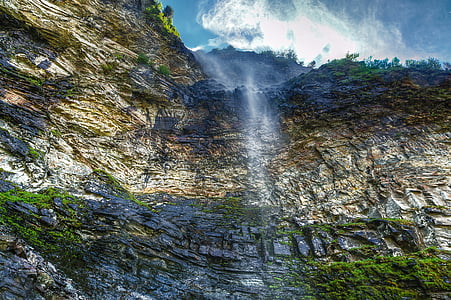 mountain cliff under white skies view thumbnail