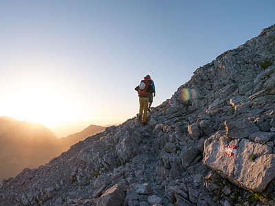 person walking on rocky mountain thumbnail