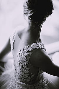 grayscale photo of woman wearing white lace dress thumbnail