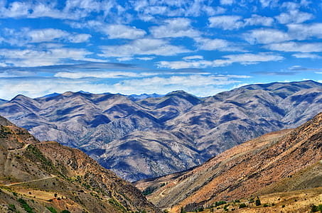 aerial photography of green grass covered mountain thumbnail