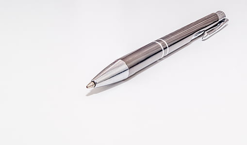 gray retractable pen on white top thumbnail
