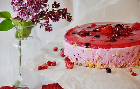 strawberry cake beside glass bottle thumbnail