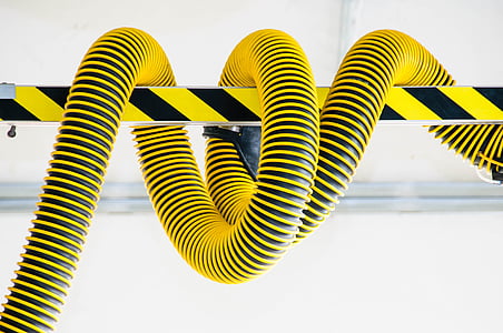 yellow and black stand wrapped with yellow hose thumbnail