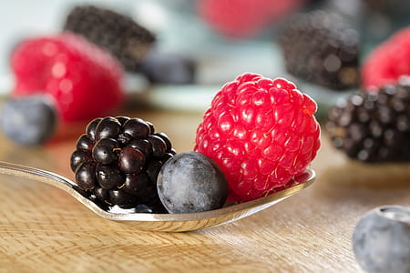 closeup photography of blackberry, raspberry and blackberry in stainless steel spoon on table thumbnail